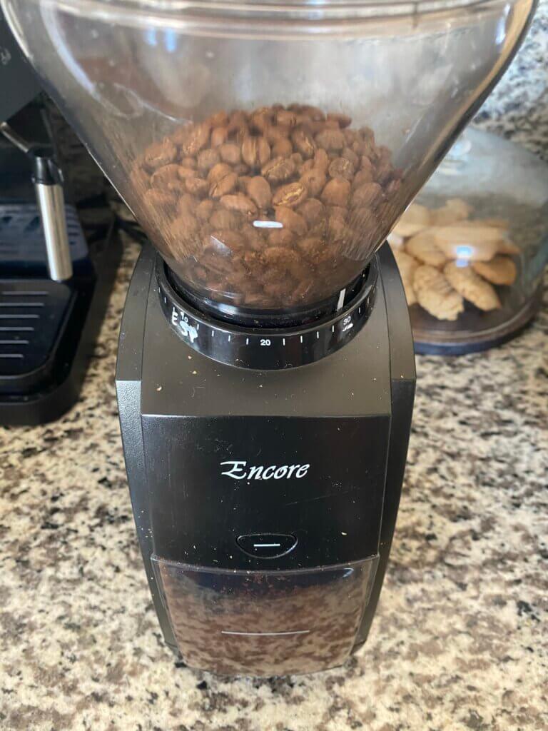 Coffee beans in a grinder