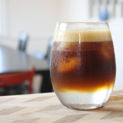 Tonic and Espresso on a wood table