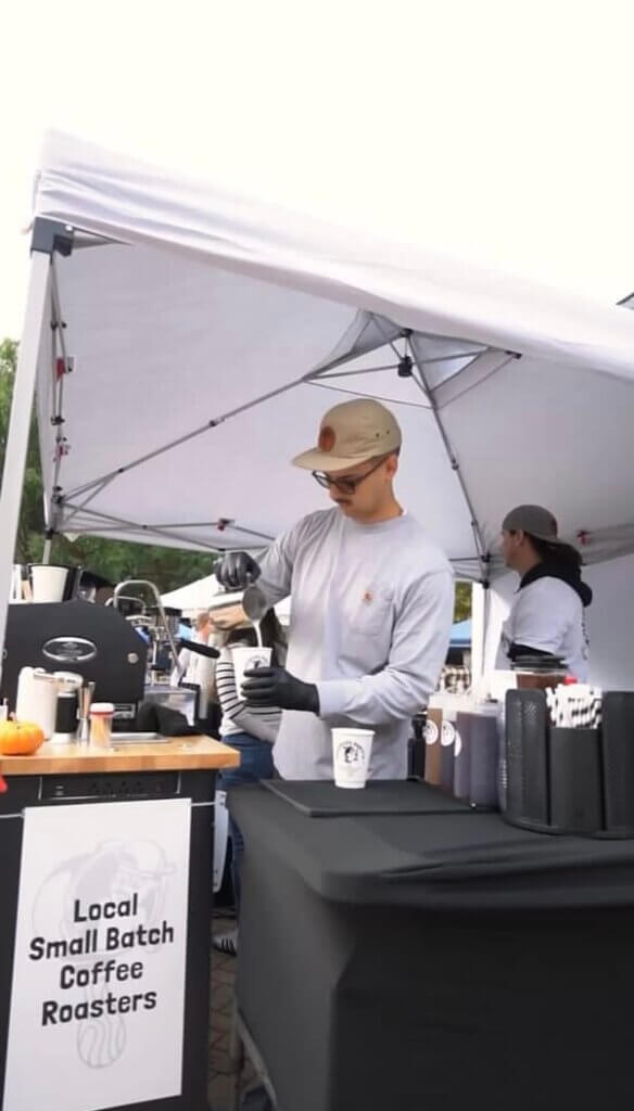 Neighbors Barista serving coffee