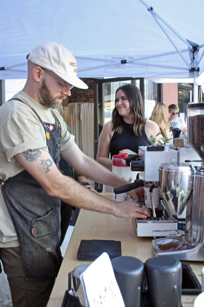 Chris and Ali at popup booth